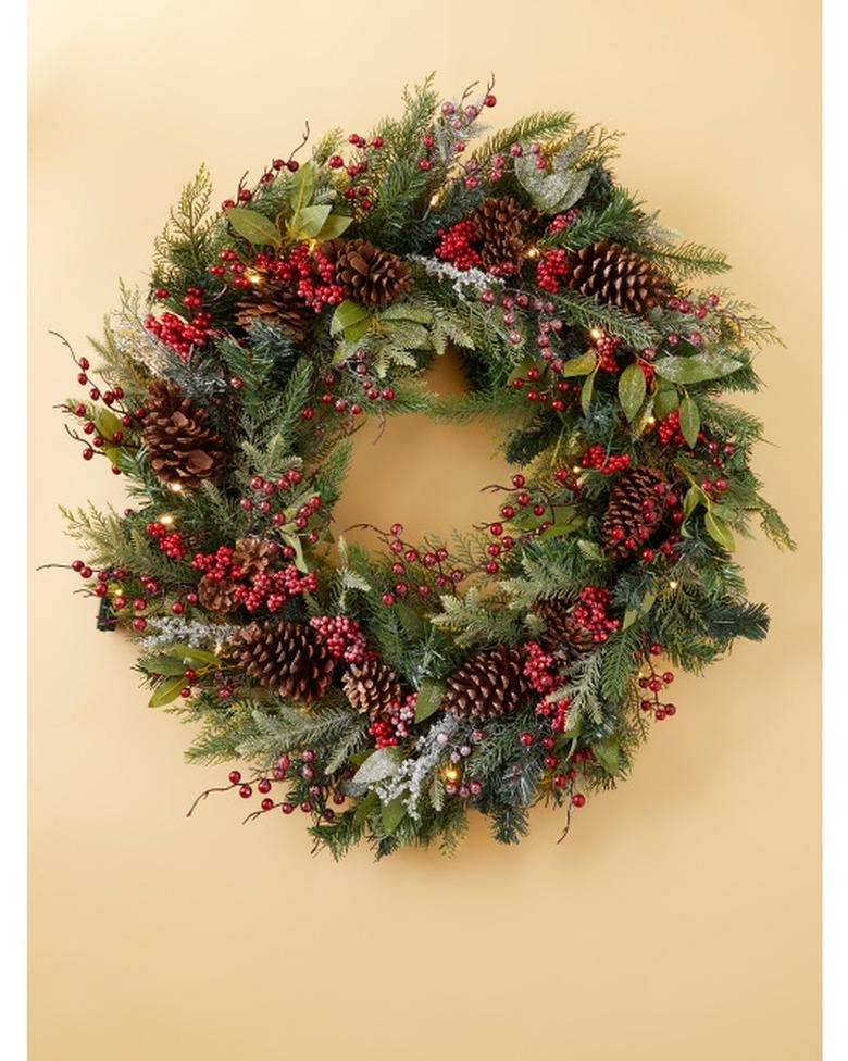 wreath with pine cones and mixed berries