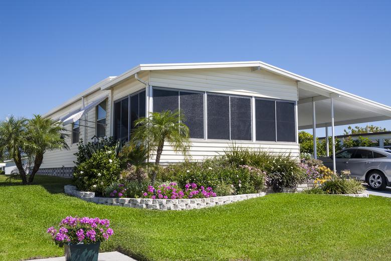 Mobile Home with Flowers and Tropical Foliage