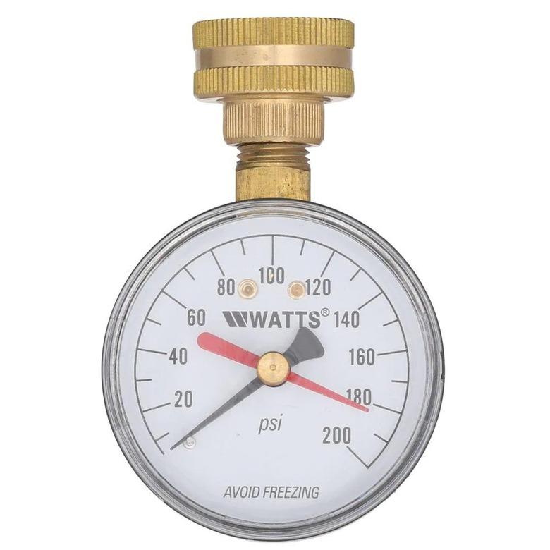 A gold and white water pressure gauge