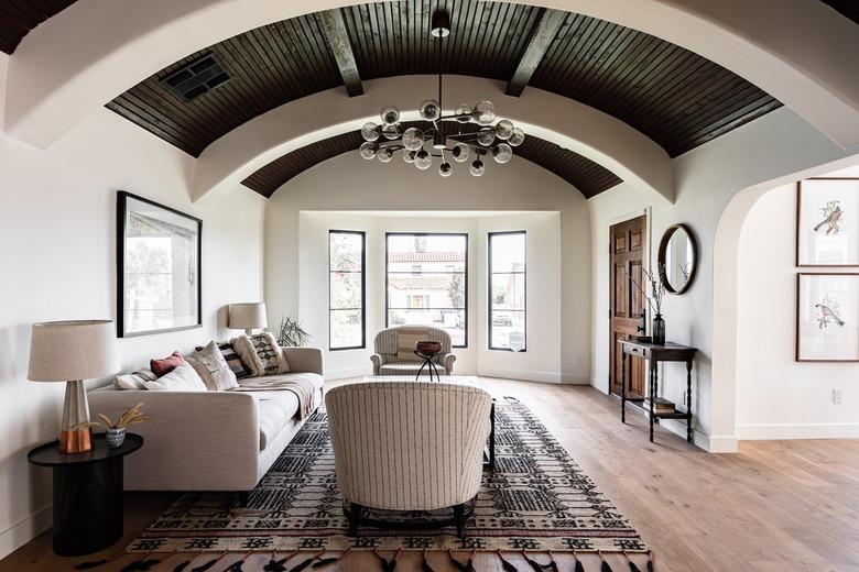 living room with bubble pendant light