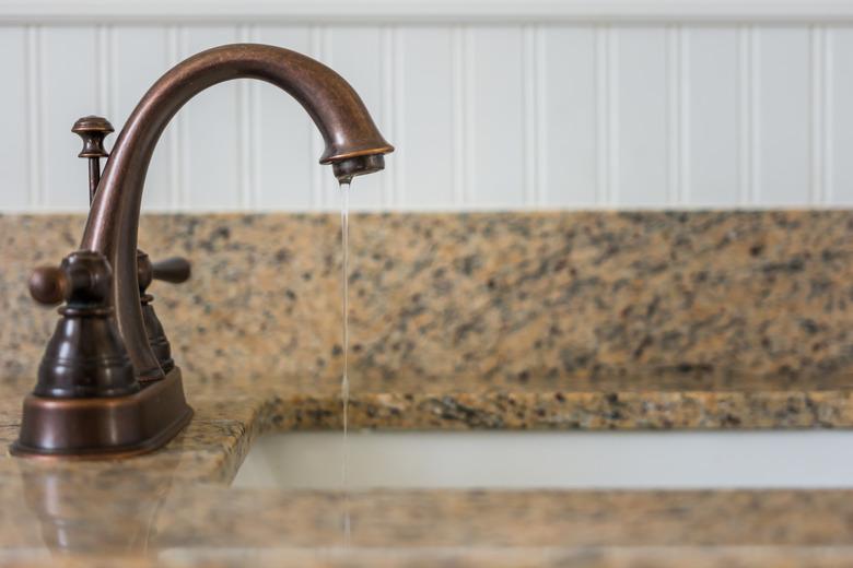 Bronze faucet and sink