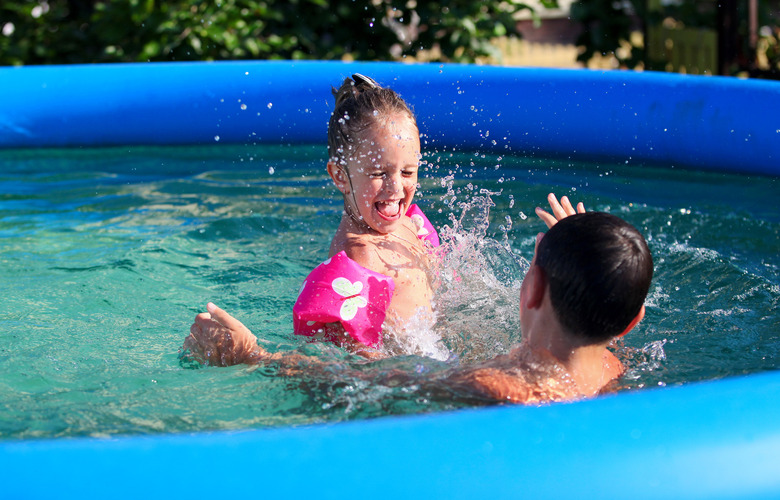 Kids having fun in the swimming pool