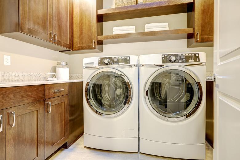 Laundry room with modern appliances.