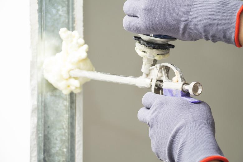 The worker installs the door