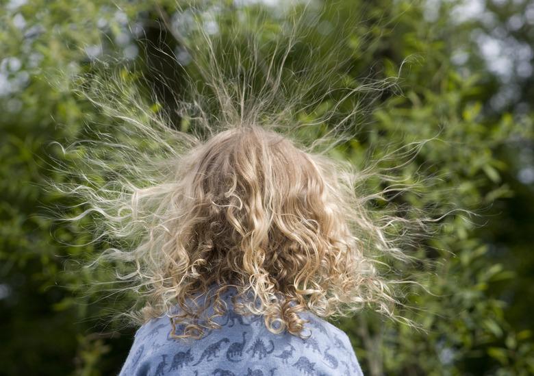 Static electricity creates frizzy and fly-away hair.