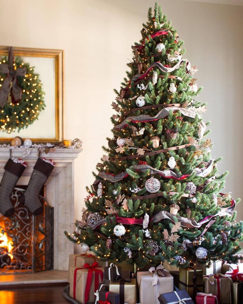 A Christmas tree with ribbon garland