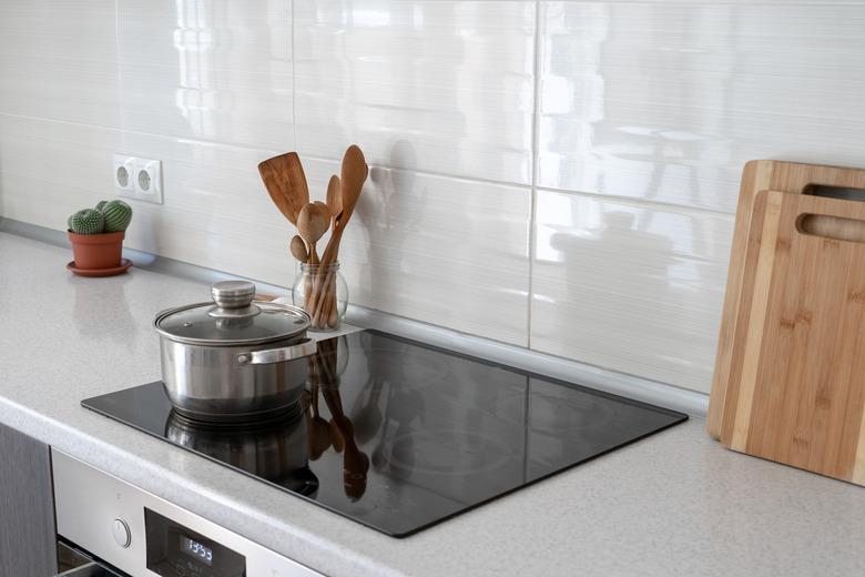 Kitchen with built in ceramic induction stove