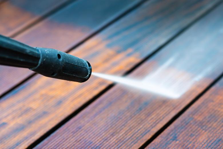 cleaning terrace with a pressure washer