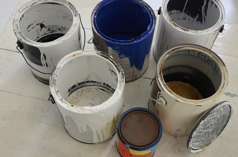 old paint cans