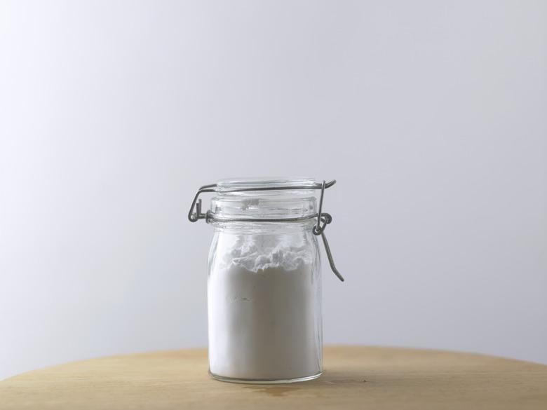 Jar Of Baking Soda On The Wooden Table