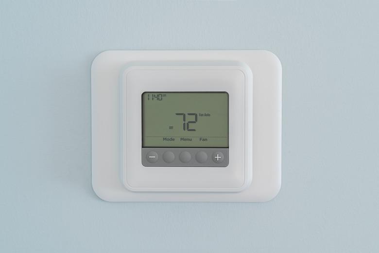 Modern residential programmable heating and cooling thermostat