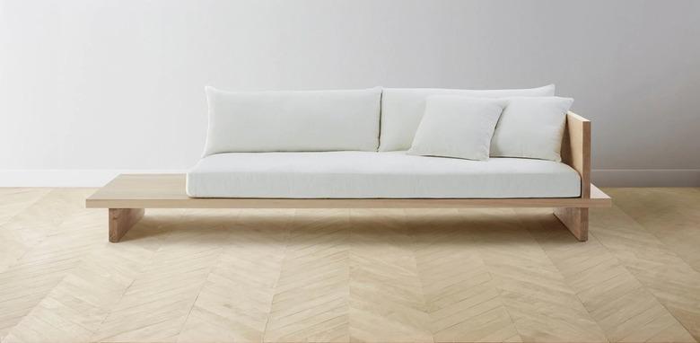 couch with wood base