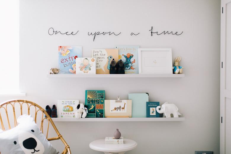 Nursery idea with IKEA shelving for books and accents