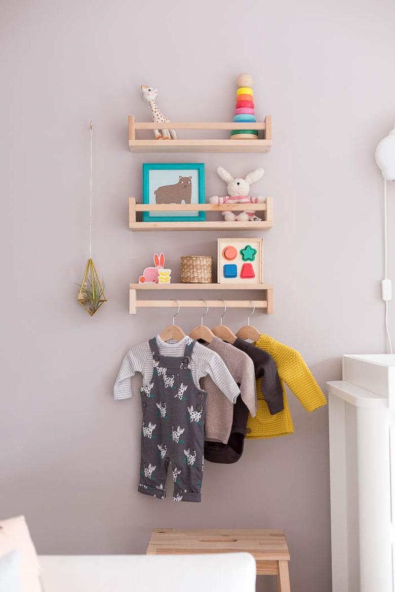 Nursery idea with IKEA spice racks for used for shelving