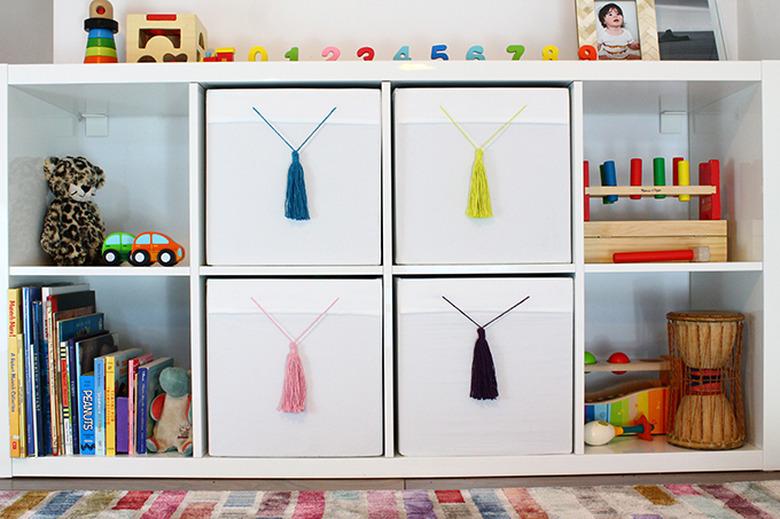 IKEA white boxes with colorful tassels