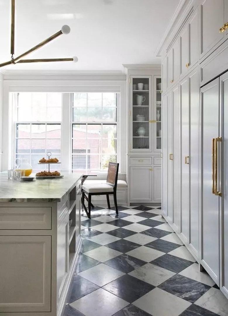 Kitchen with marble floor tiles