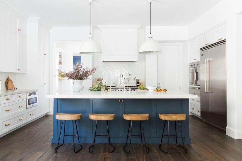 Kitchen island back panel idea with faux cabinet doors by Studio McGee