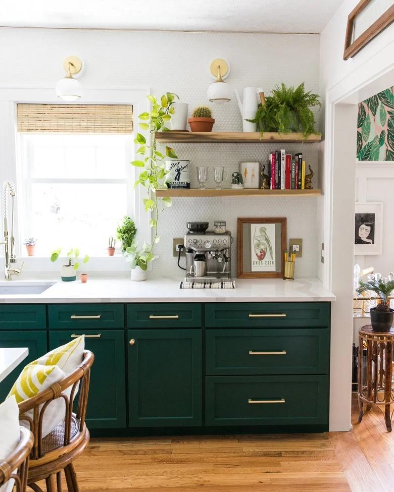 brass and white wall sconces in white and green boho kitchen