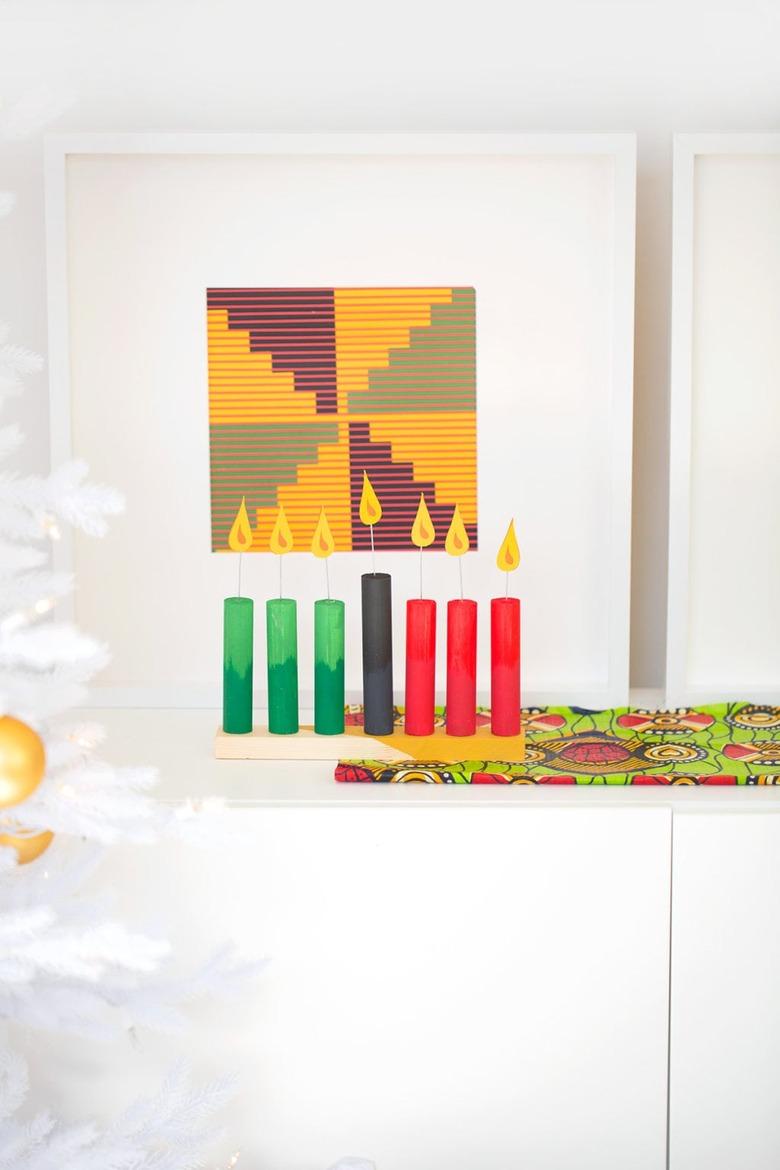 Kwanzaa decorations, kinara on a white backdrop