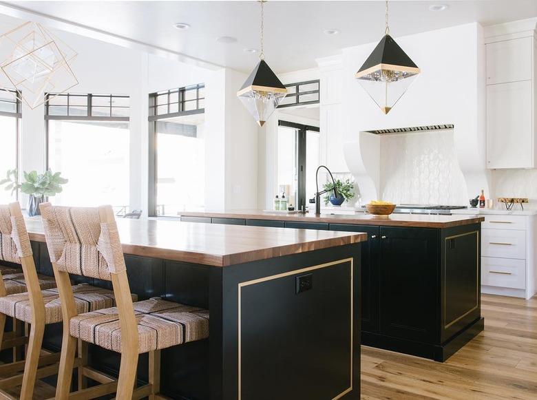 large open kitchen with two black islands