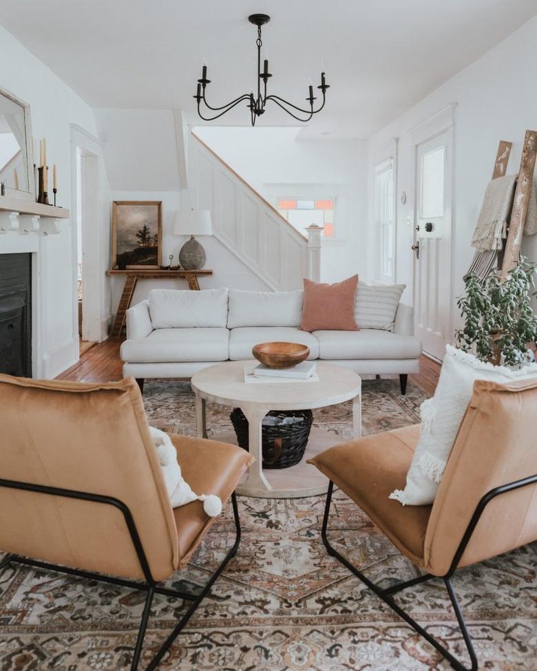 farmhouse living room with black candelabra chandelier