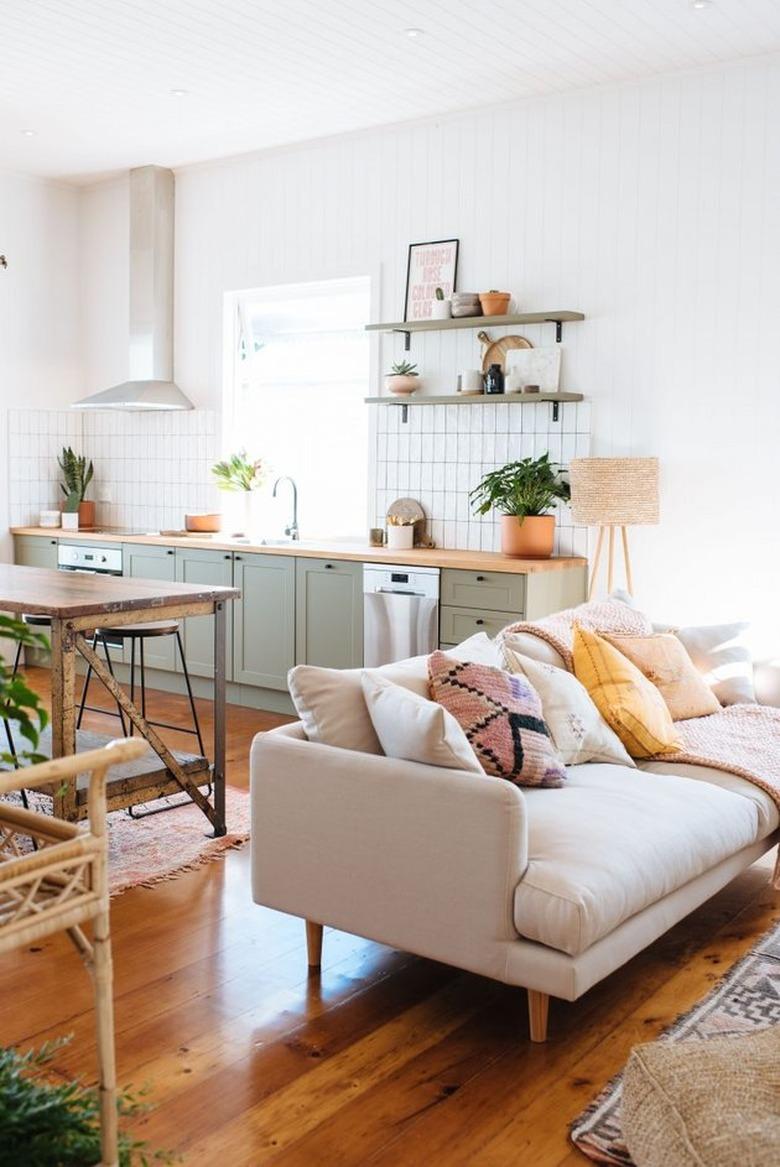 A kitchen and a living room together