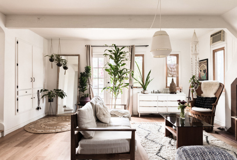 A white fabric pendant lightens up this eclectic space.