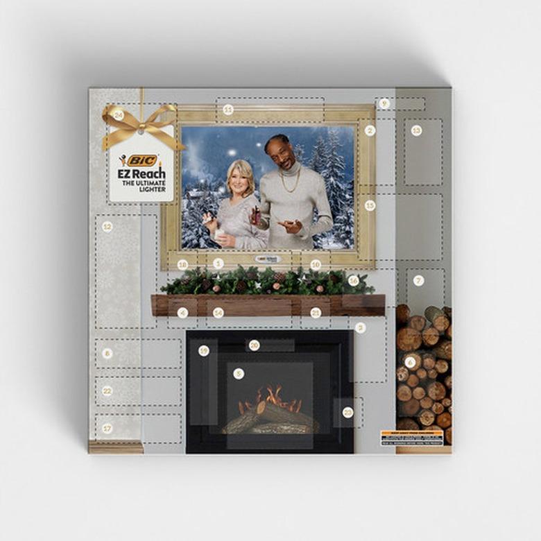 Martha Stewart and Snoop Dogg advent calendar with a fireplace on a white background.