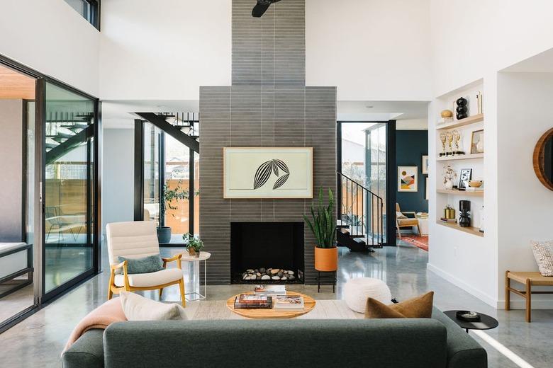 midcentury living room with gray tiled fireplace