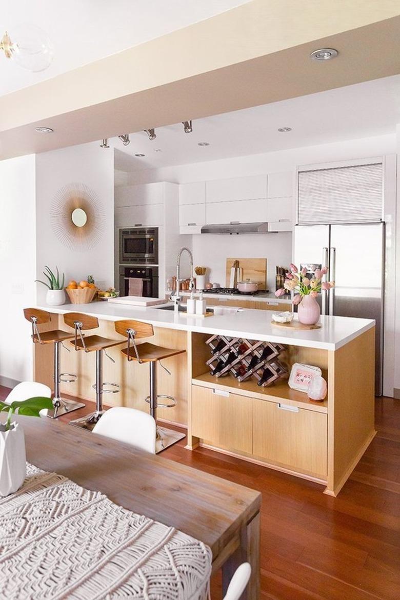 midcentury modern kitchen space with hardwood floors