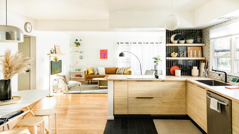 midcentury-inspired kitchen with wood cabinets and wood and slate floors