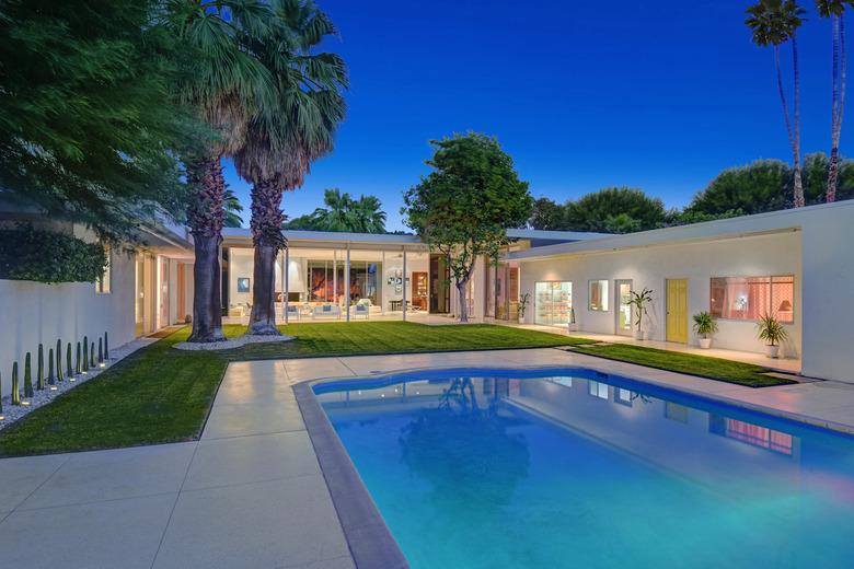 outdoor area of house with pool