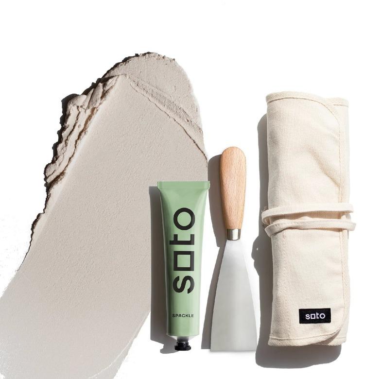 spackle kit with a green tube that says 