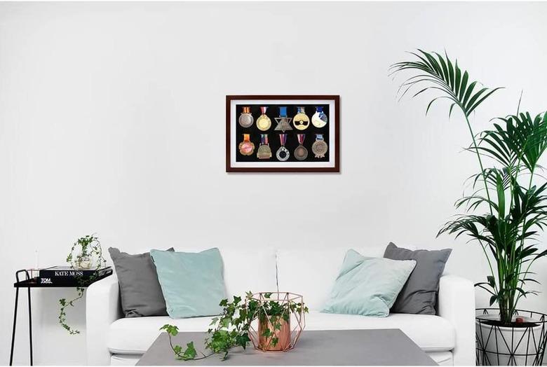 Medal Display Shadow Box Frame Hanging on Living Room Wall