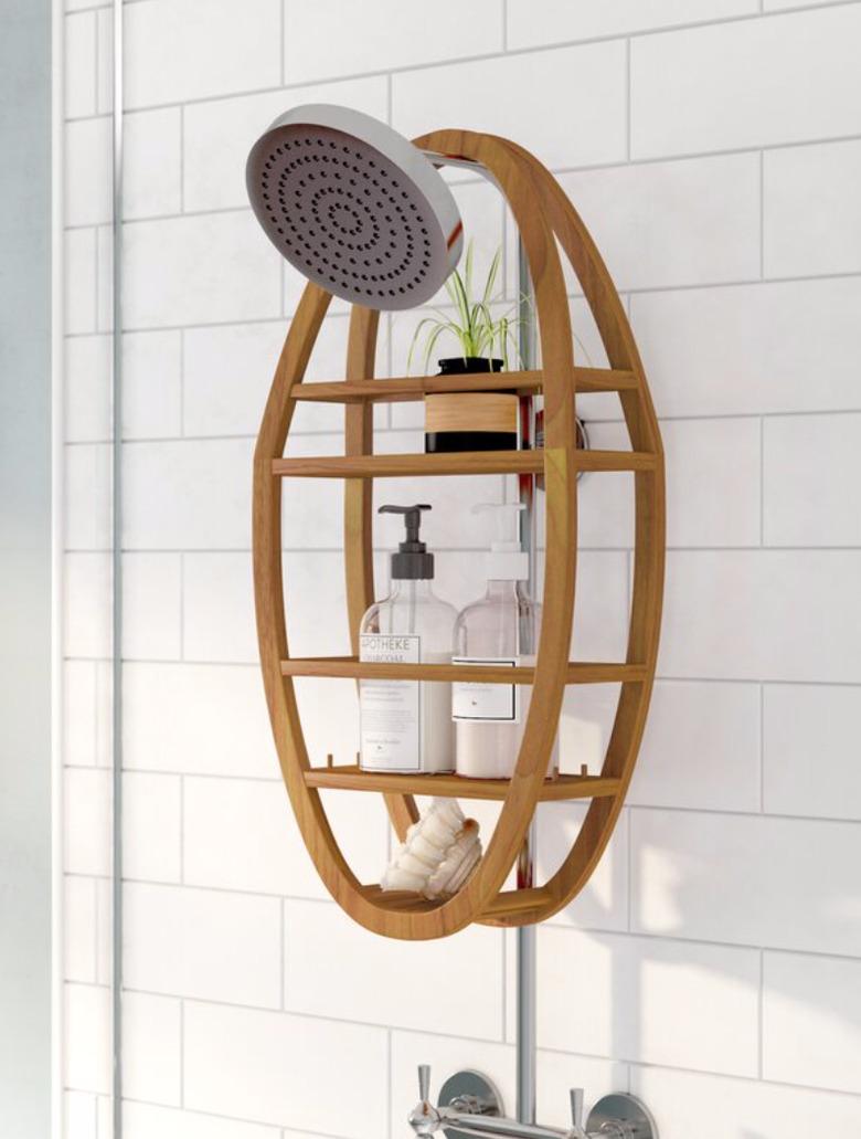 Wood best shower caddies, shower head, plant, soaps, shampoos, subway tile.