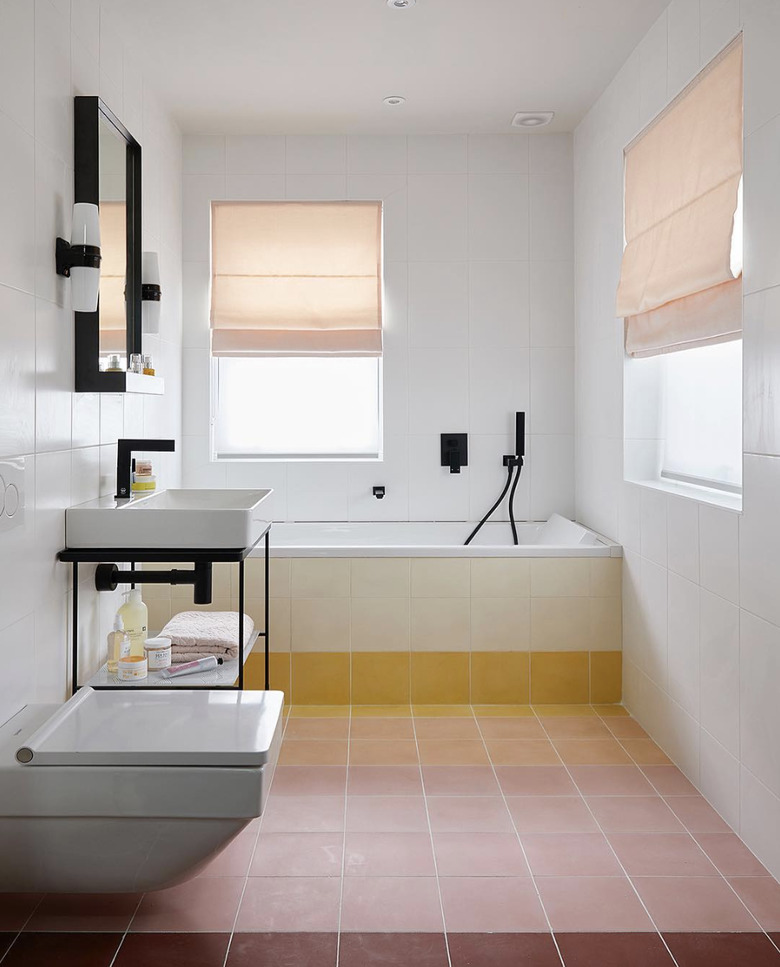 Minimalist bathrooms with terra cotta tile and roman shades