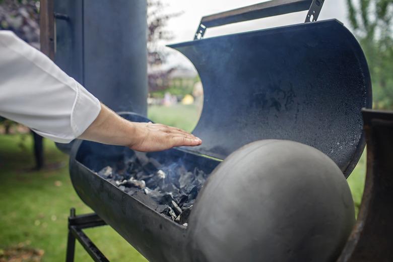 Smoker grill in home backyard.