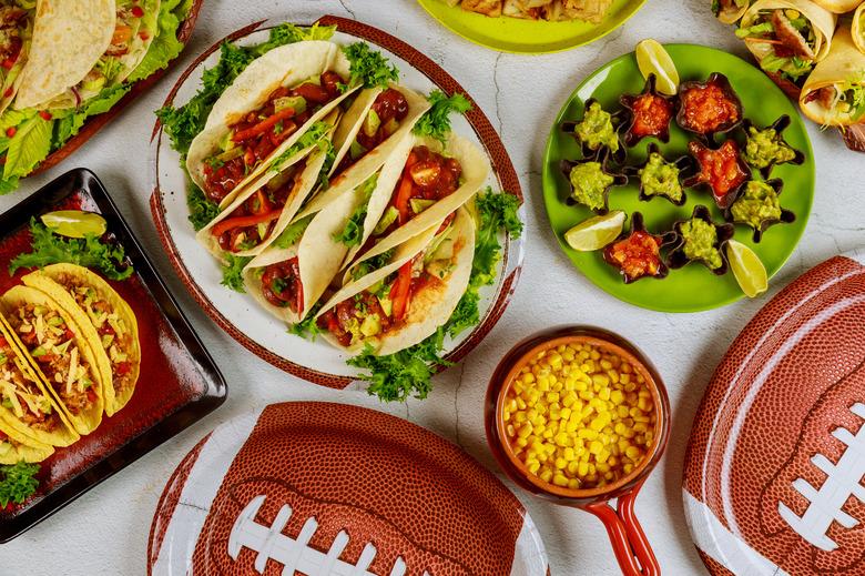 Party table for watching american football game. Mexican cuisine.