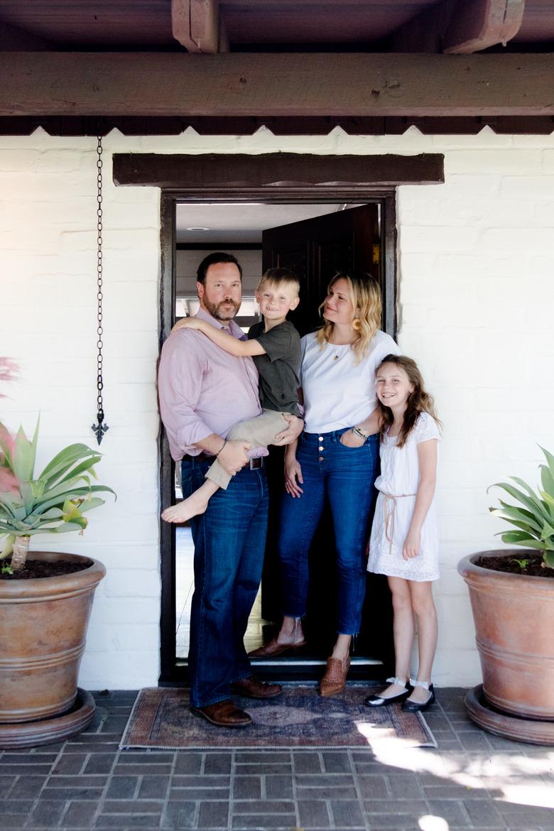 Meghan and Family in the entryway of their California adobe.