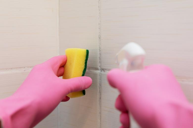 Cleaning dirty tile and removing mold from grout.