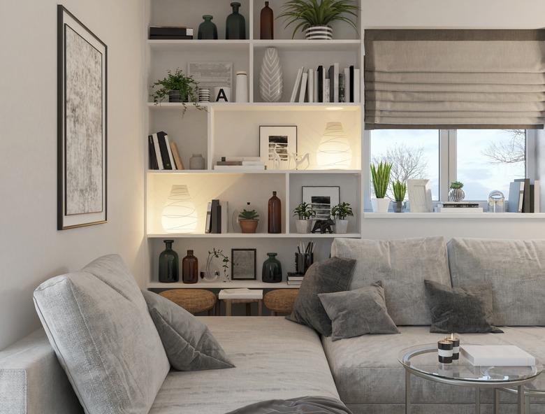 Domestic living room, fabric shade, bookcase, neutral colors