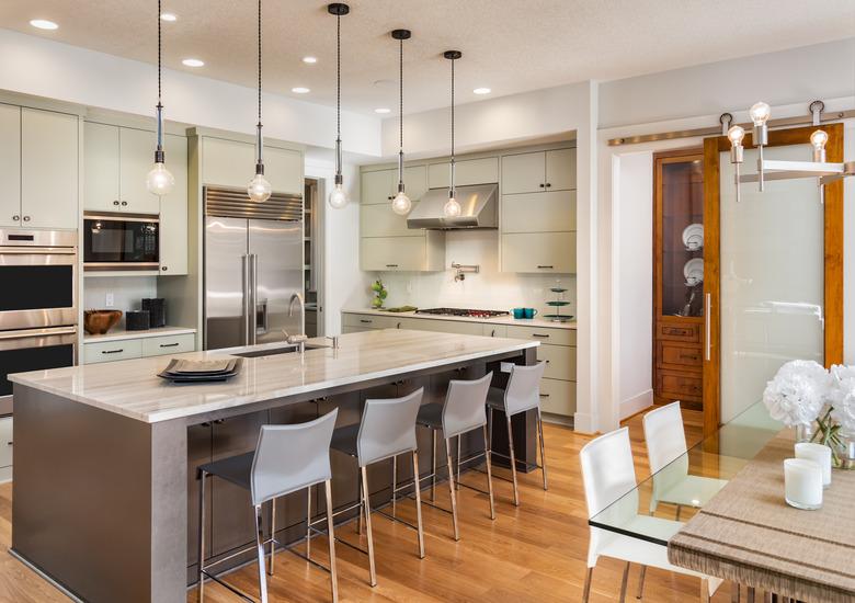 Beautiful Kitchen in Luxury Home with Island and Stainless Steel