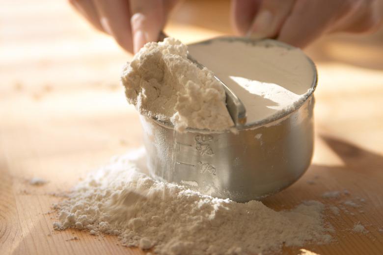 Measuring flour.