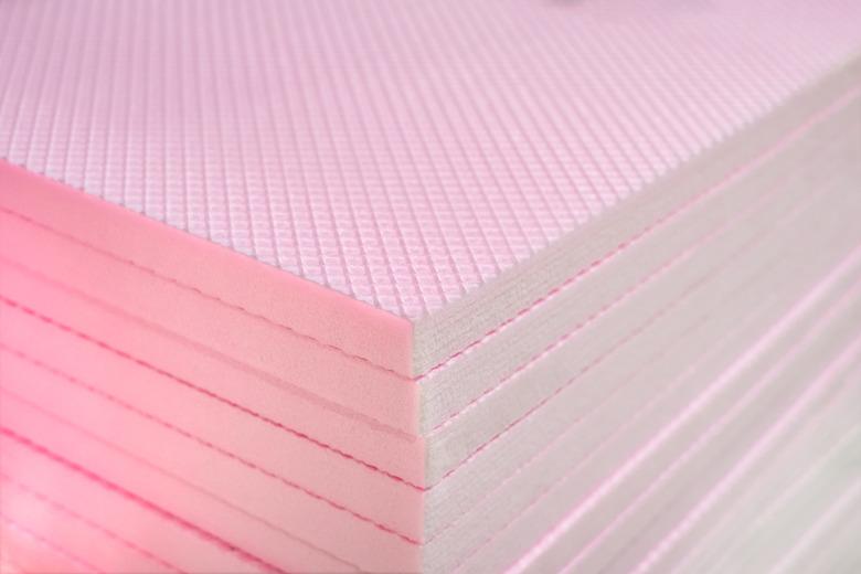 Pink Extruded Polystyrene XPS Foam Thermal Insulation Boards Stacked at Construction Site