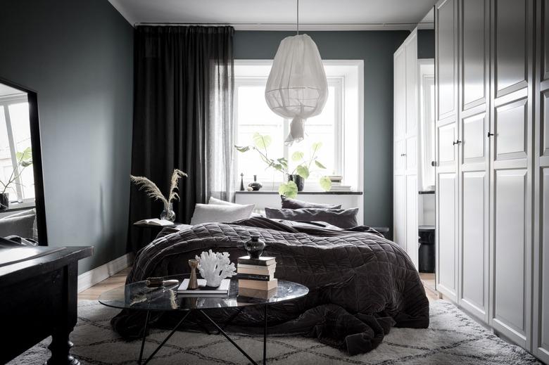 cozy bedroom ideas with gray walls and floor to ceiling drapery