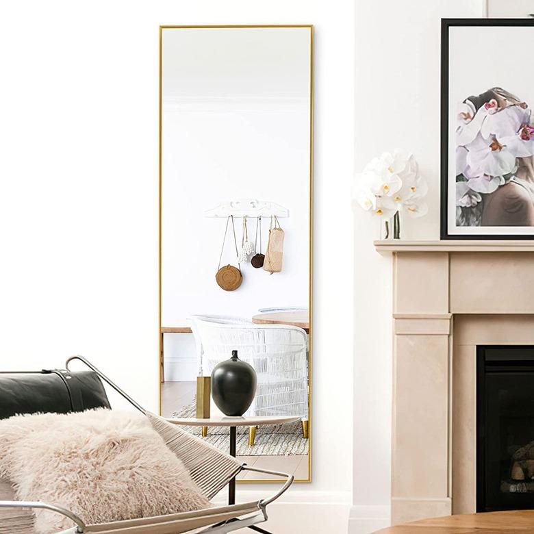 long mirror on wall in neutral room