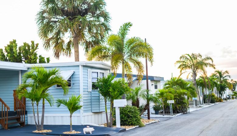 Mobile home community in a sunny suburban neighborhood.