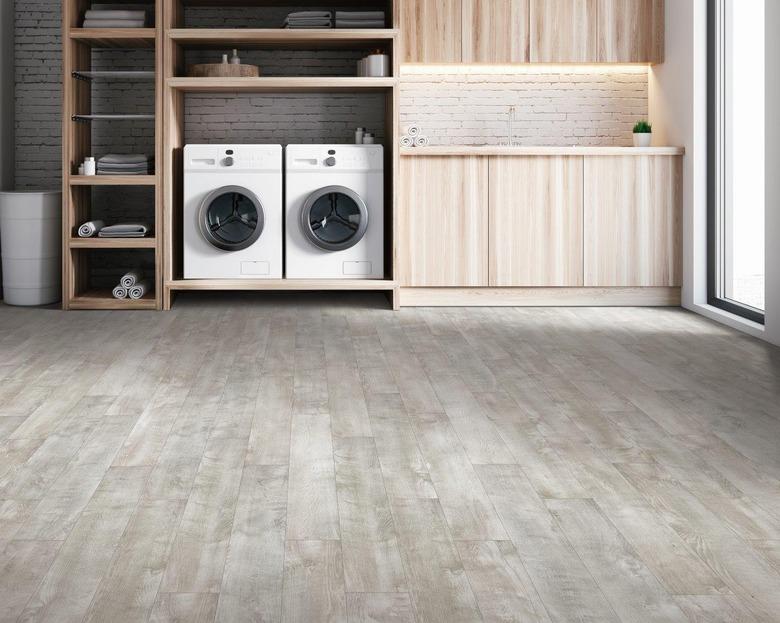 Vinyl flooring in laundry room.