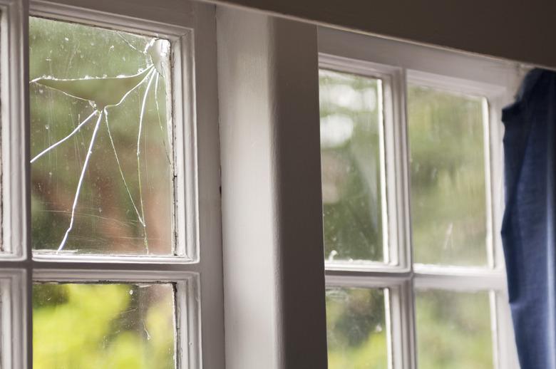 Broken window in an old home