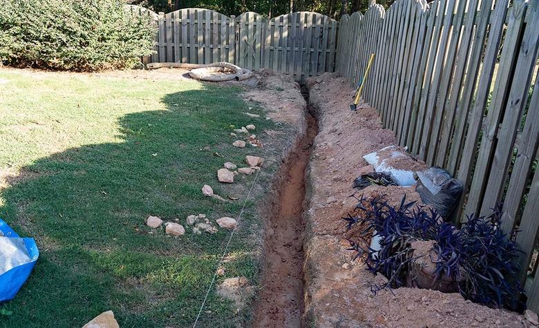 Trench for installation of French drain